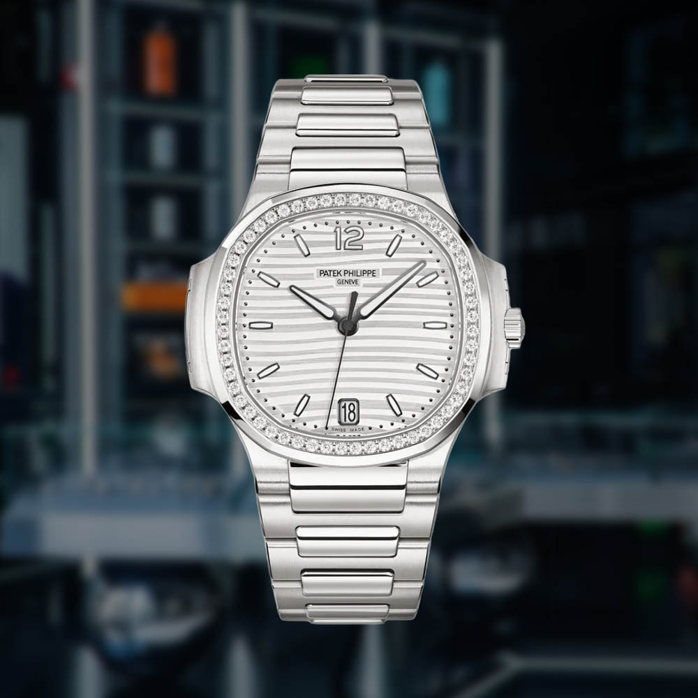 Patek Phillipe Nautilus 7118/1A White Opaline Dial with Baguettes| The Watch Meister