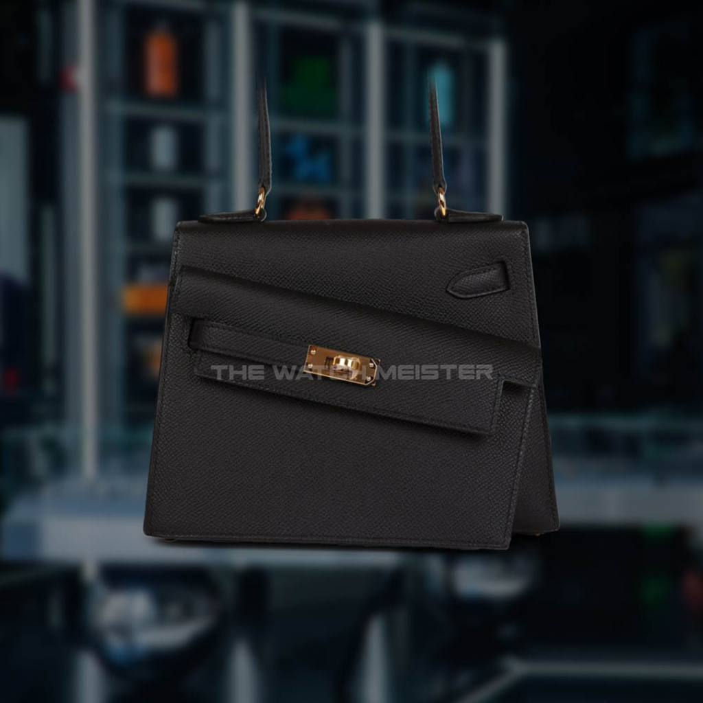 Stylish black handbag featuring gold hardware, perfect for fashion enthusiasts and luxury accessory collectors.