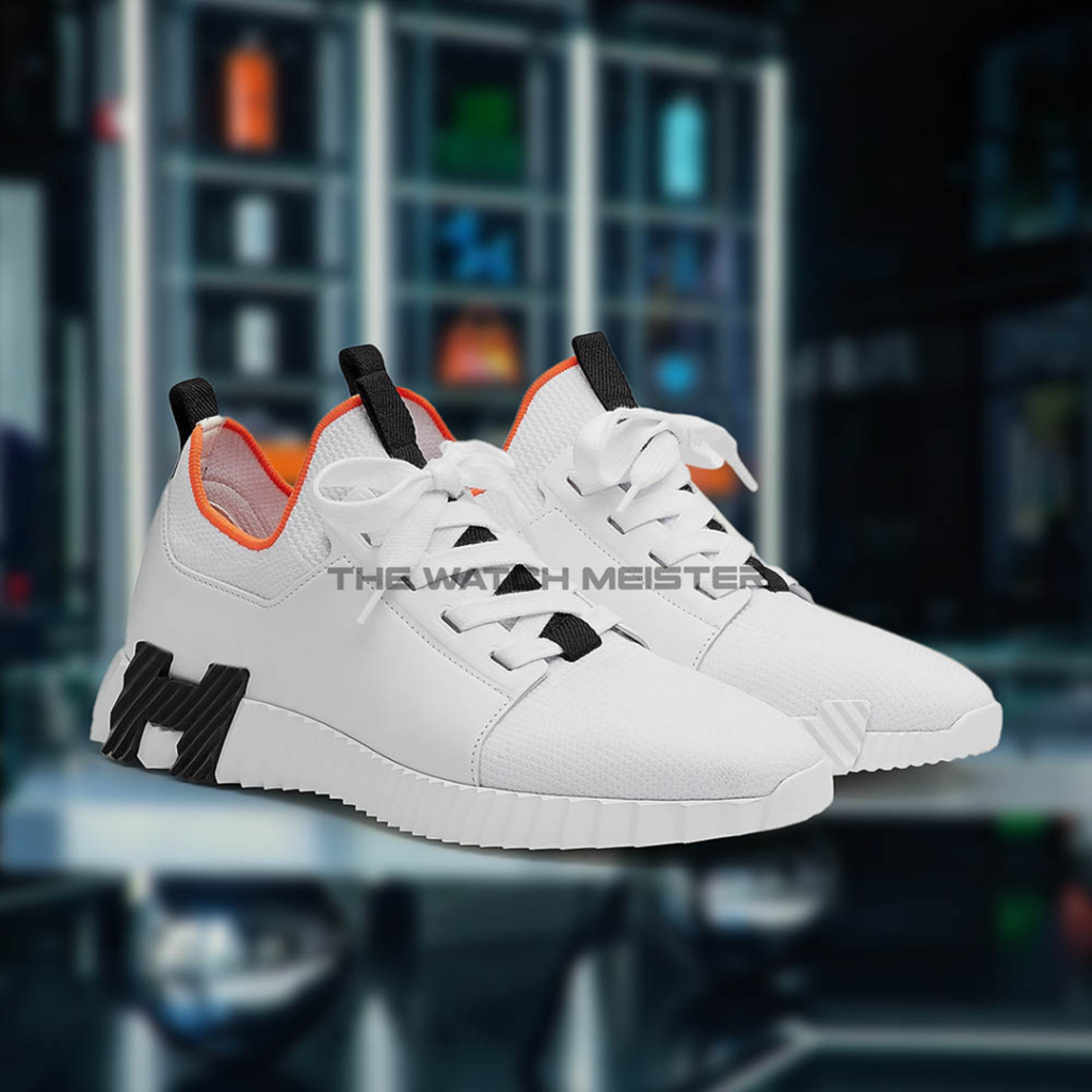 White athletic sneakers featuring black and orange accents, designed for comfort and style, suitable for various activities.